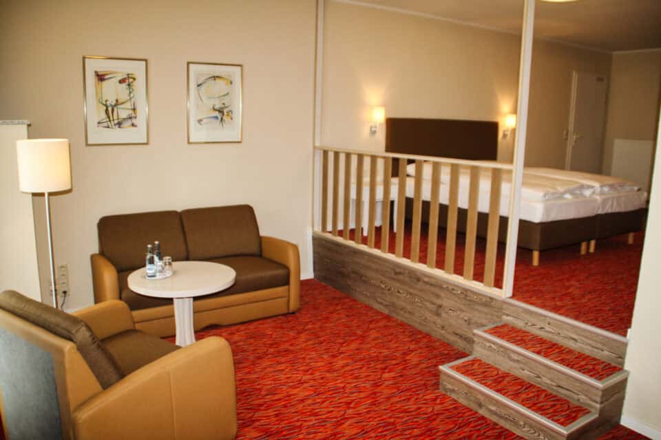 Doppelzimmer mit Wohncouch im Hotel garni Mueßer Hof