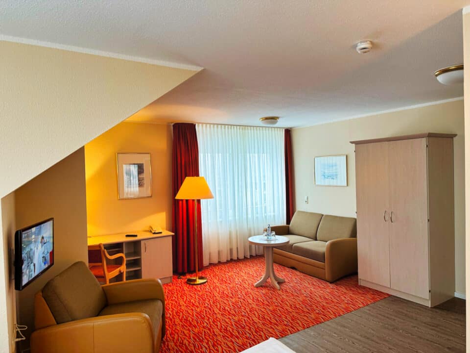 Doppelzimmer mit Wohncouch im Hotel garni Mueßer Hof